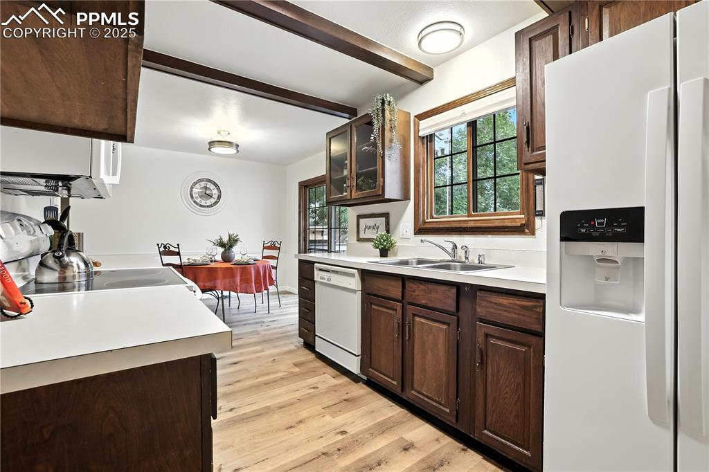 Image 14 of 50: Charming beamed ceiling accent for old-world charm
