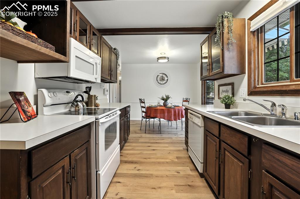 Image 15 of 50: Kitchen with new flooring