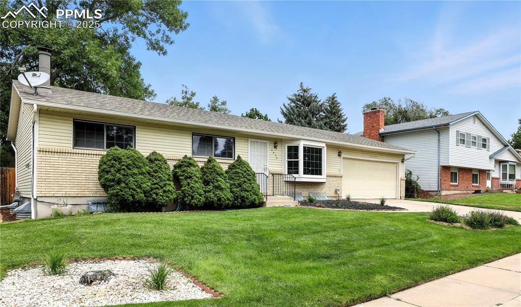 Image 2 of 50: Lovely and well maintained with spacious double car garage.