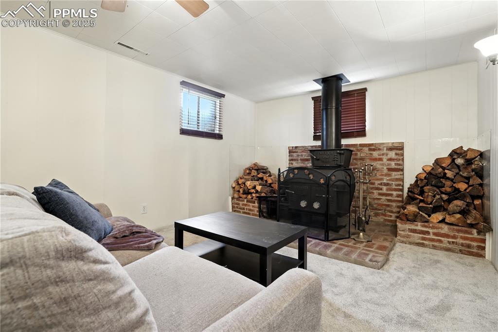 Image 31 of 50: Built in fire-wood storage for a beautiful Colorado feel