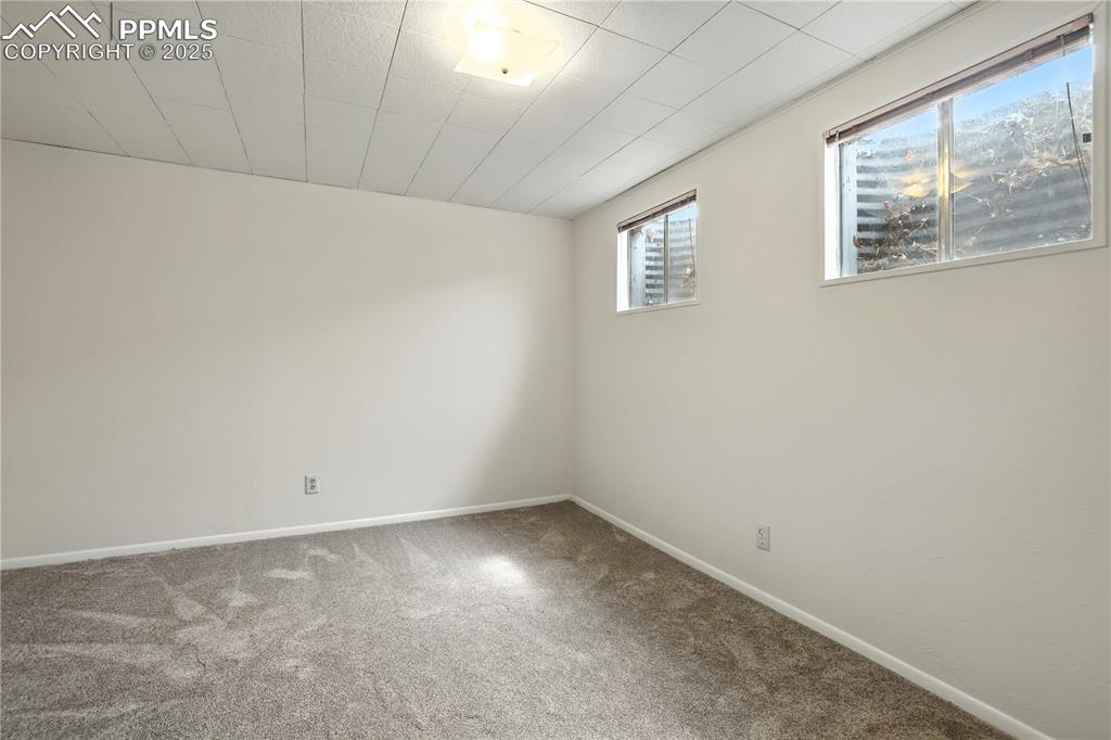 Image 32 of 50: Fourth Bedroom on the basement level
