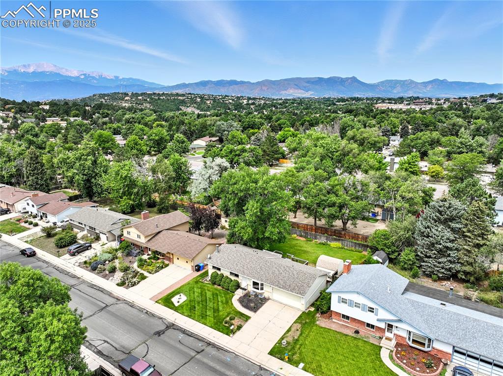 Image 50 of 50: Aerial View of this lovely neighborhood with the mountains featuring Pike