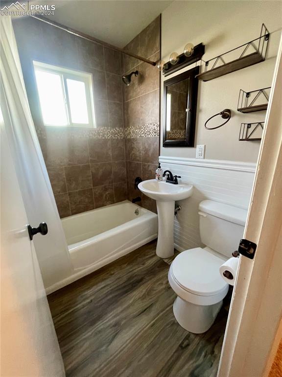 Image 20 of 47: Main Level Full Bathroom had a recent remodel.