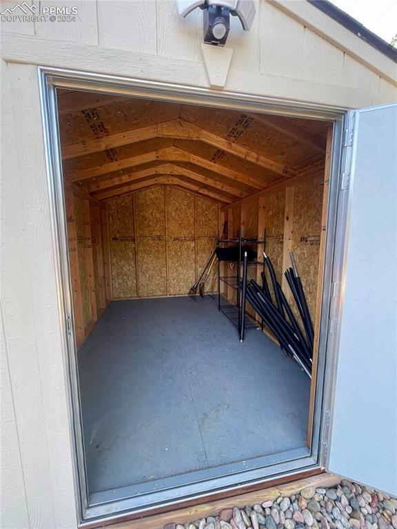 Image 47 of 47: Inside view of storage shed. Plenty of room for yard stuff, bikes or shop.