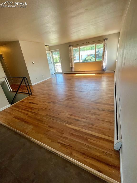 Image 5 of 47: Looking from Kitchen toward Great Room