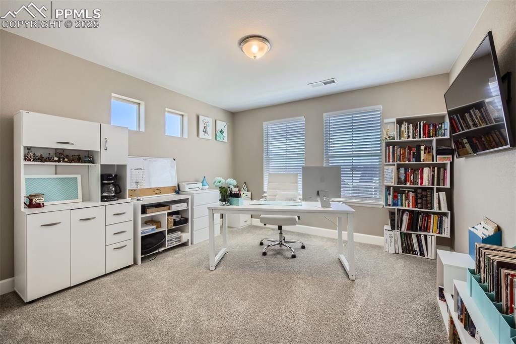 Image 23 of 30: Office upstairs could be a 5th bedroom