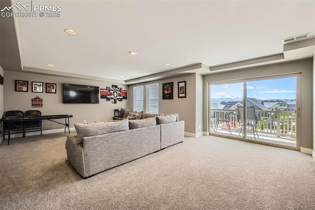 Image 25 of 30: VIEWS VIEWS VIEWS!! The expansive upstairs family room is ready for games,