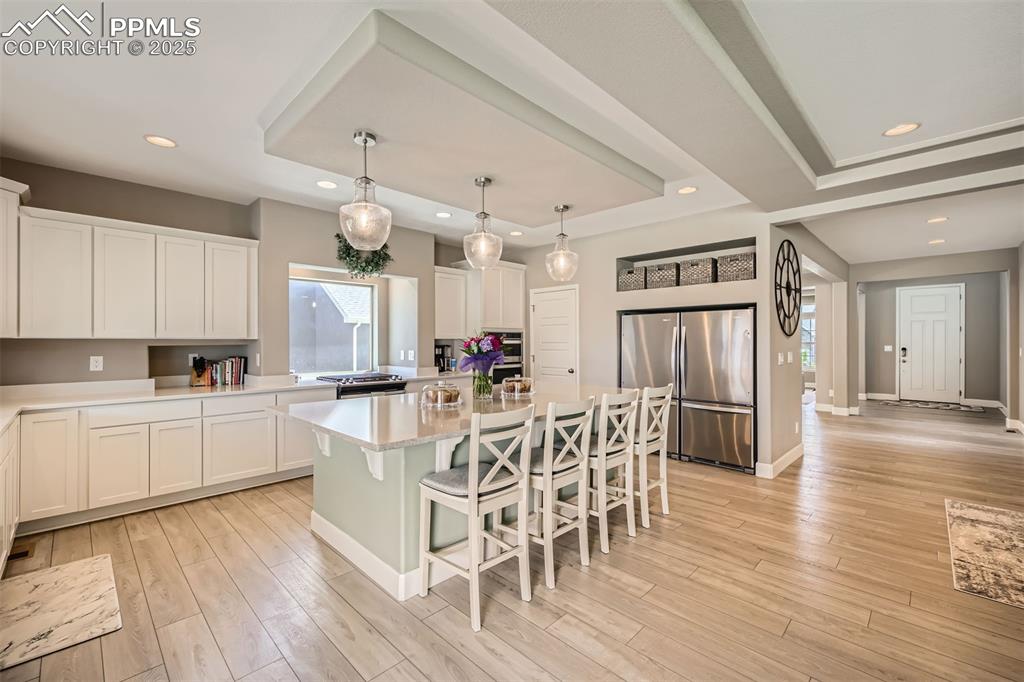 Image 3 of 30: Jaw-dropping kitchen with Double Refrigerator, Double Oven and Enormous Qua