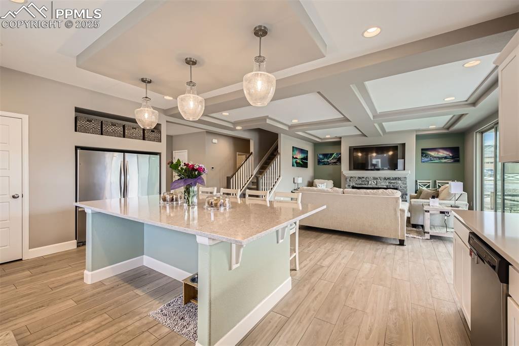 Image 8 of 30: Ginormous kitchen opens to family room