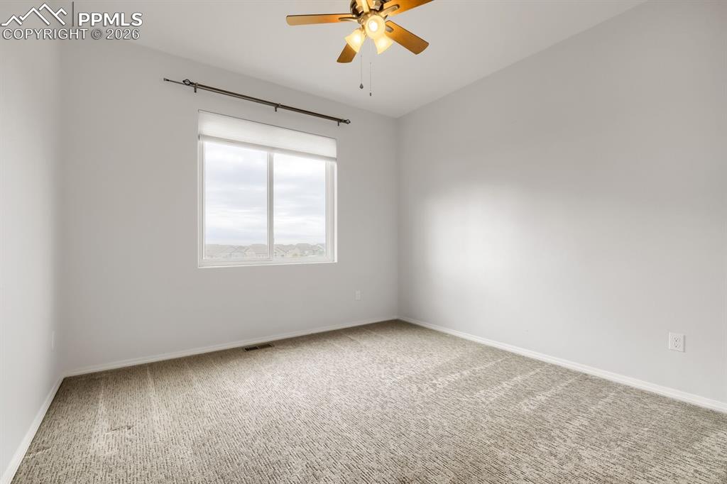 Image 14 of 33: Bedroom