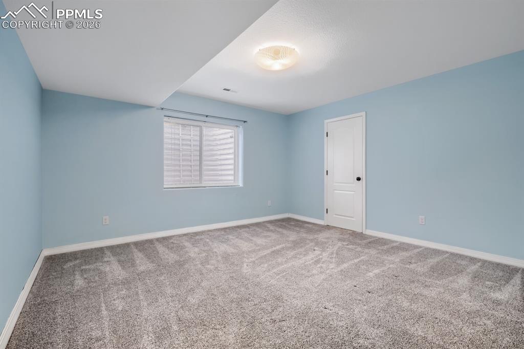 Image 23 of 33: Bedroom