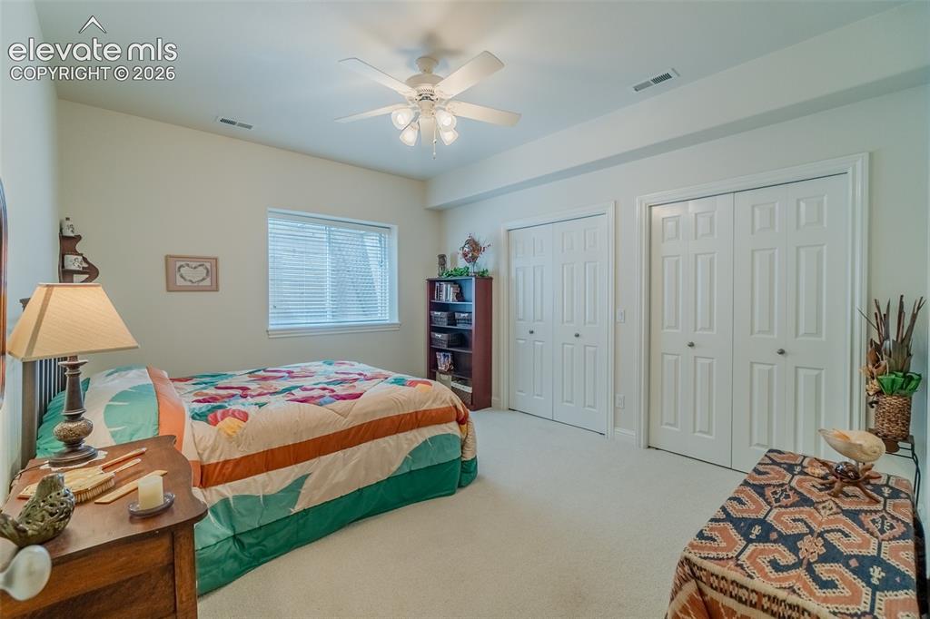 Image 39 of 47: Carpeted interior space featuring a window with horizontal blinds, a ceilin