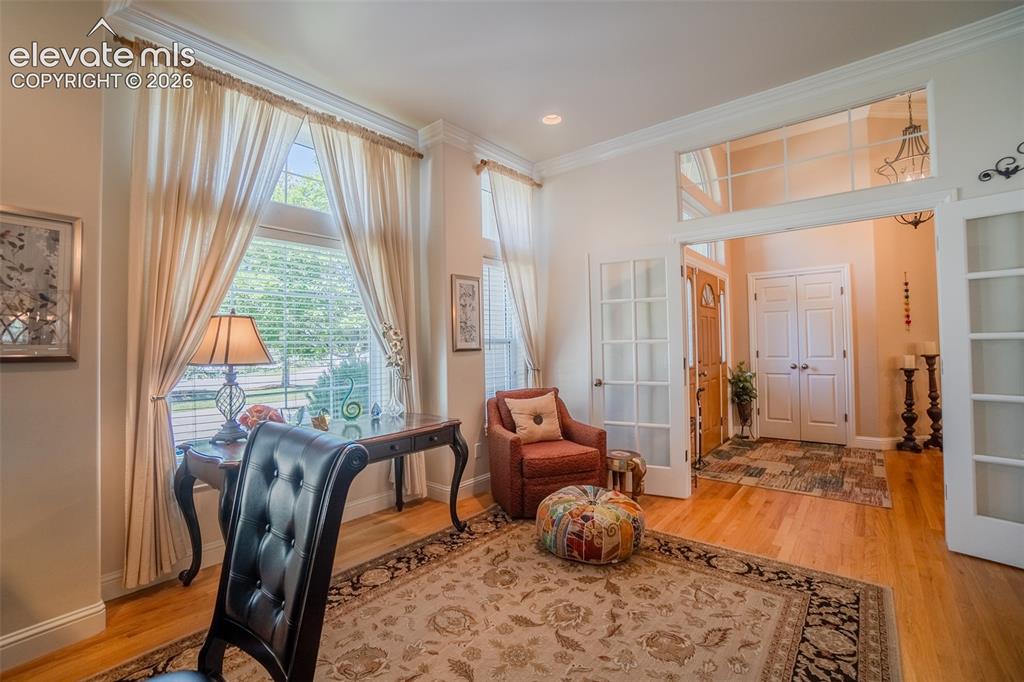 Image 6 of 47: Front Room off the foyer with Huge Windows! Coat closet and large French D
