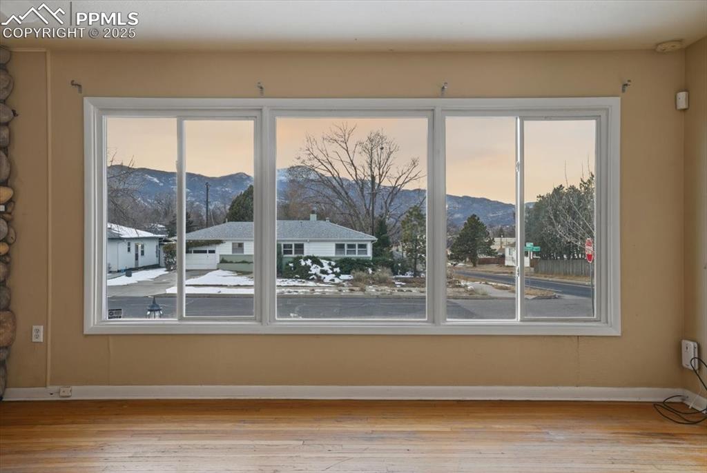 Image 10 of 42: Family Room with Incredible Pikes Peak Views