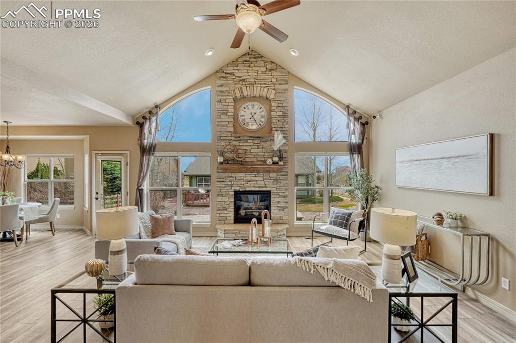 Image 14 of 50: Enormous picturesque windows frame the great room, flooding the living spac