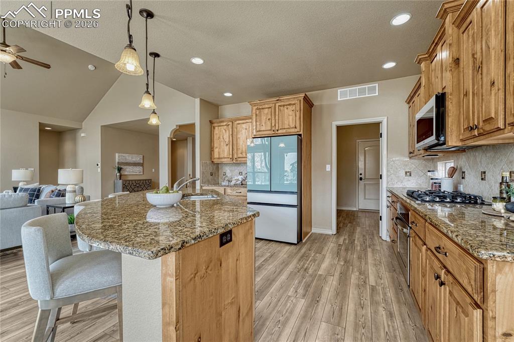 Image 23 of 50: High-end finishes and a thoughtful layout, including a large walk-in pantry