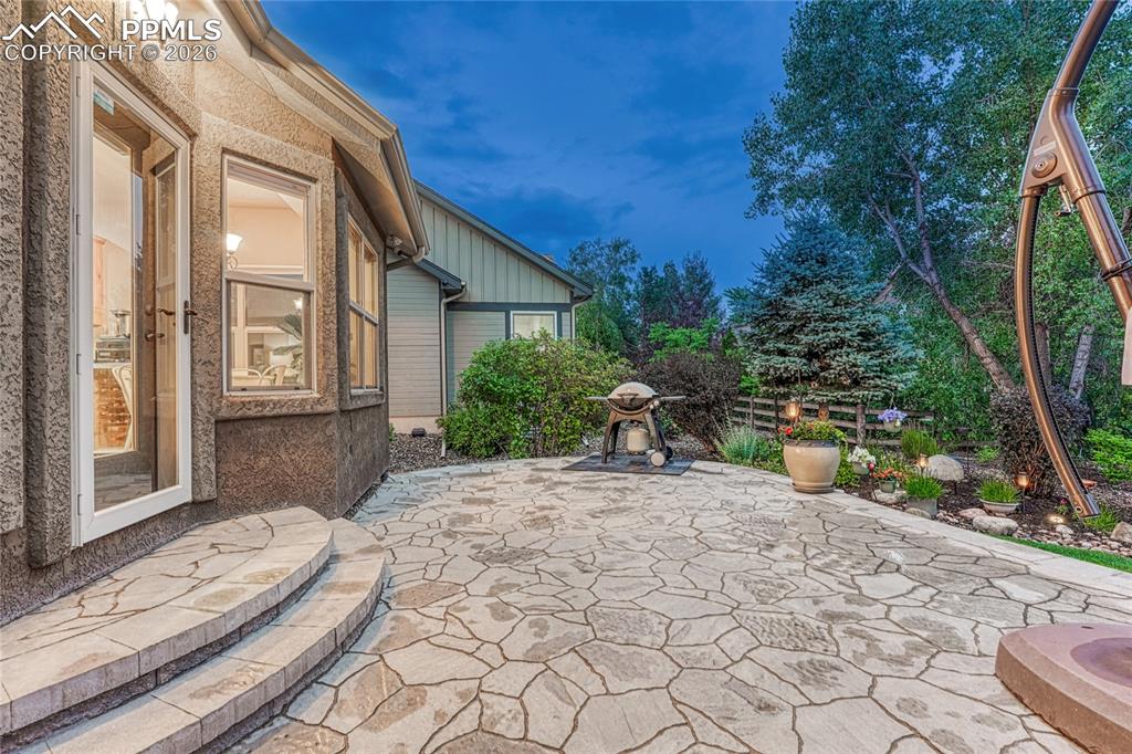 Image 41 of 50: The expansive back patio provides plenty of room for a grill station and ou