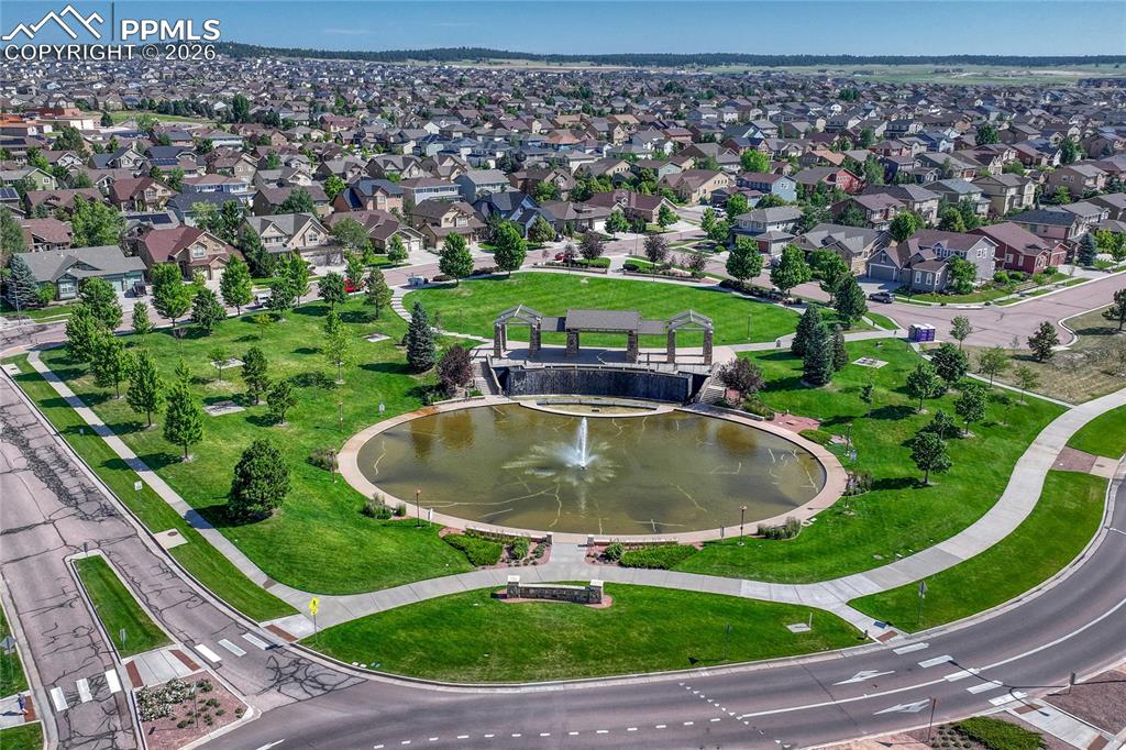 Image 49 of 50: Enjoy beautiful paved walking paths, open green spaces, and community ponds