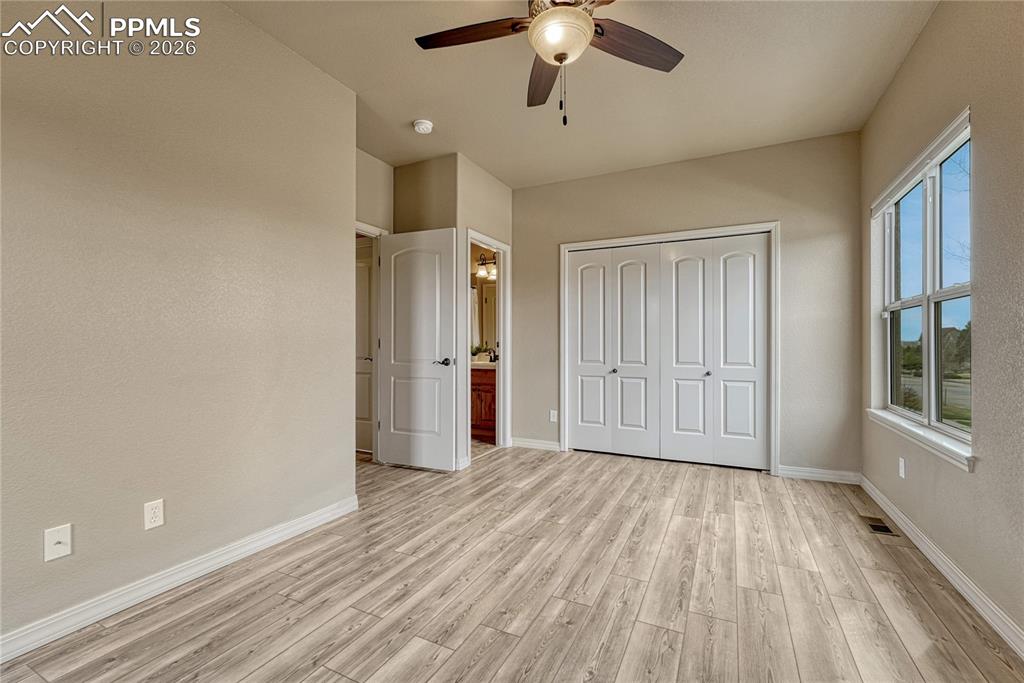 Image 8 of 50: The junior suite offers ample closet space and tall ceilings, ensuring comf