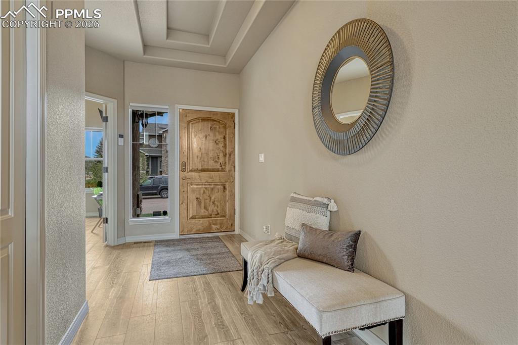 Image 9 of 50: The entryway’s thoughtful design gives you a dedicated drop-zone the moment