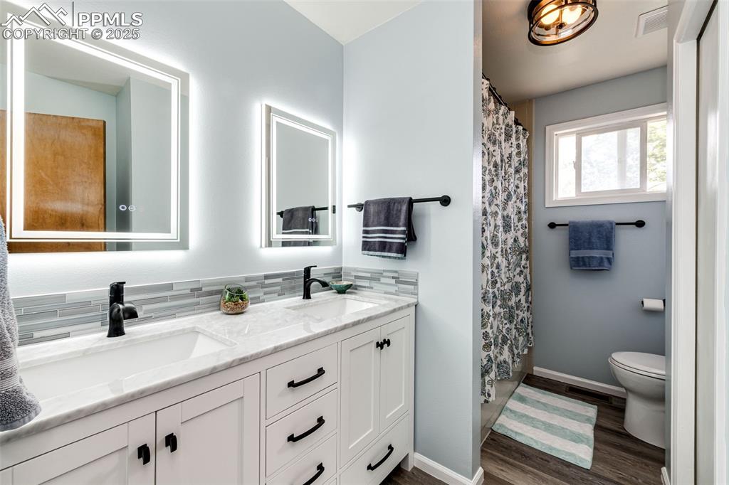 Image 15 of 33: UPDATED BATHROOM