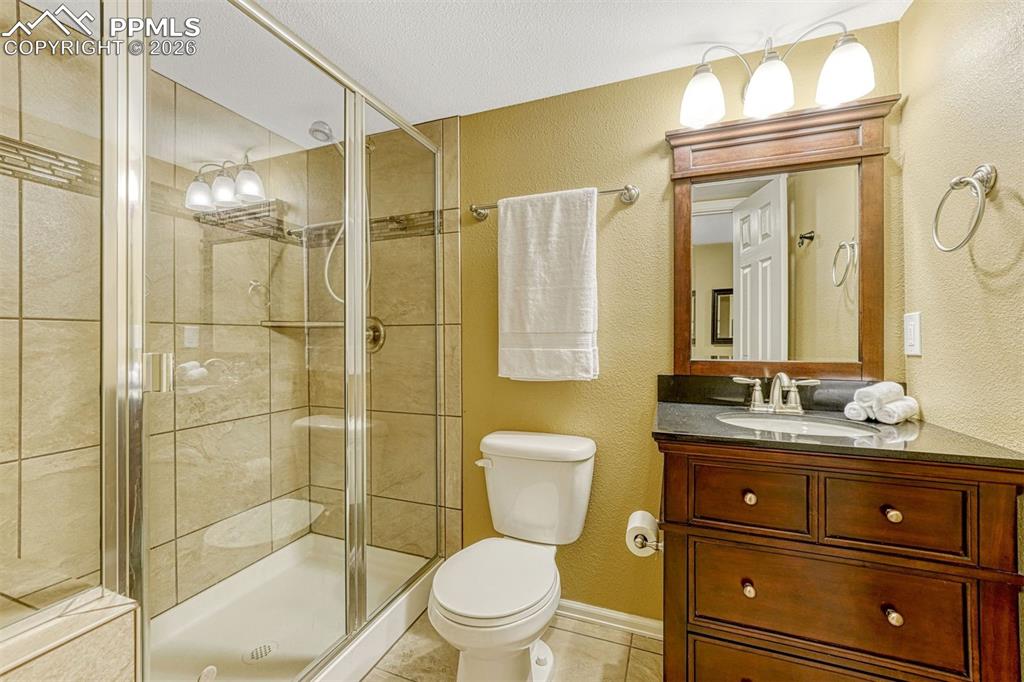 Image 13 of 46: 3/4 updated bathroom in basement