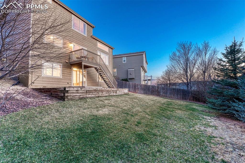 Image 16 of 46: Large grassy yard