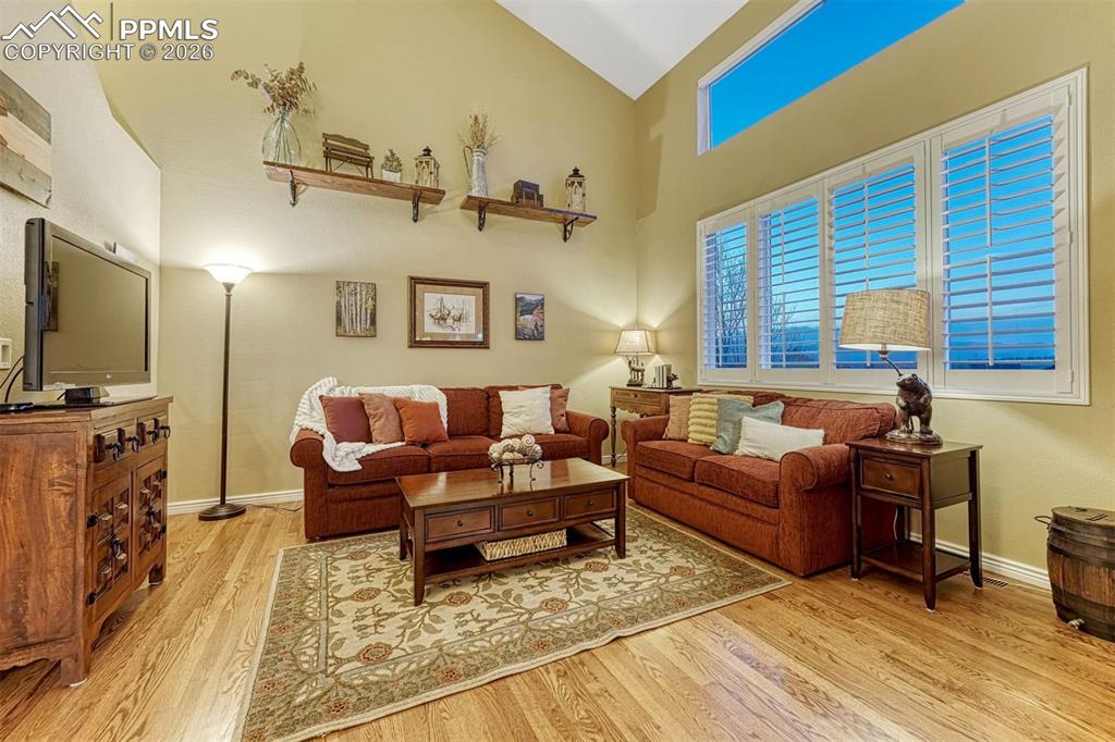 Image 2 of 46: Gleaming hardwood floors and mountain views