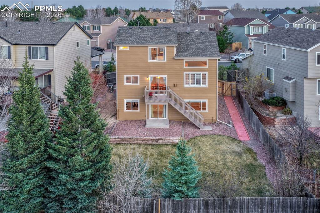 Image 20 of 46: Beautiful evergreen trees provide privacy and your home has new exterior pa