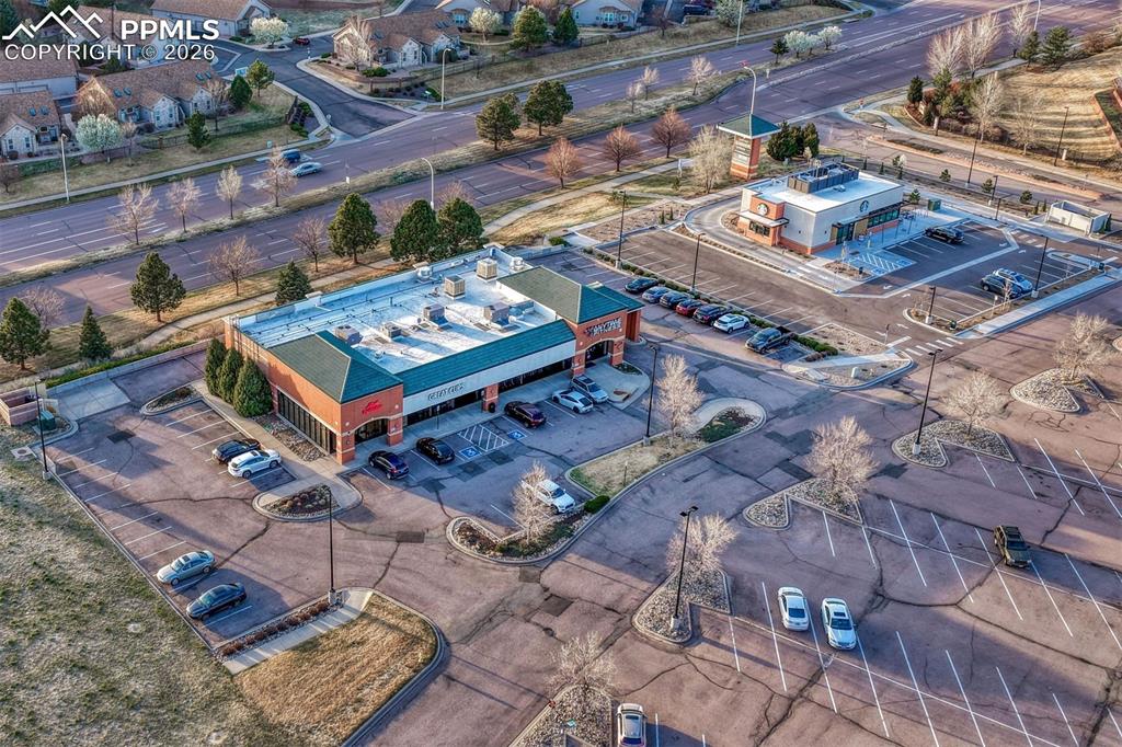 Image 44 of 46: Starbucks, hair cuts and dry cleaning at the edge of your neighborhood