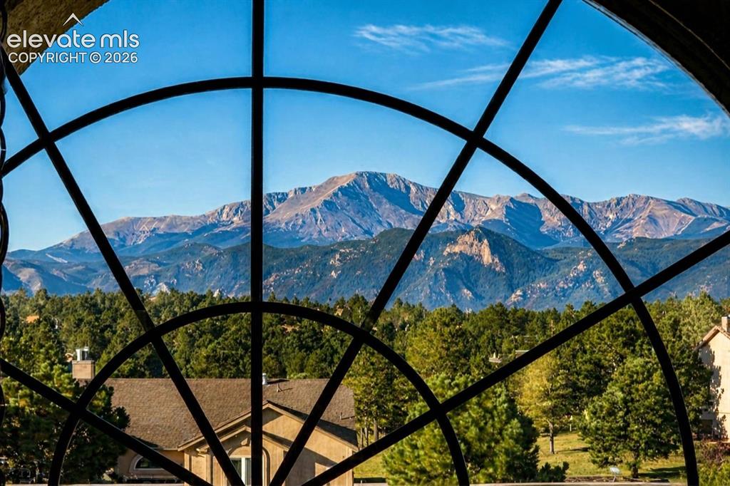 Image 12 of 49: Entry window with view of Pikes Peak