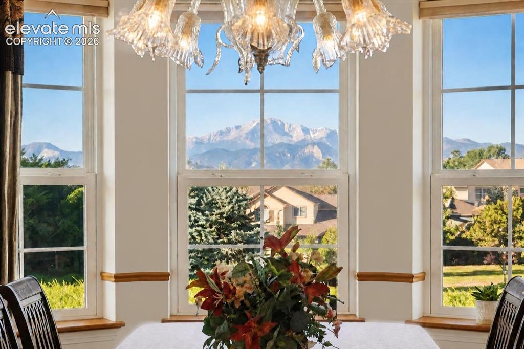 Image 17 of 49: Dining Room View of Pikes Peak