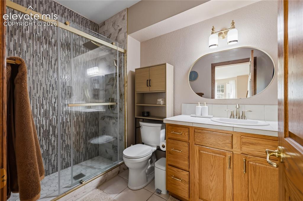 Image 36 of 49: Junior Suite - Bathroom - Shower with glass enclosure and mosaic tile surro
