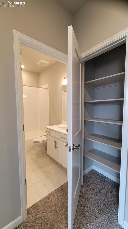 Image 27 of 36: Linen closet next to full bathroom! 
