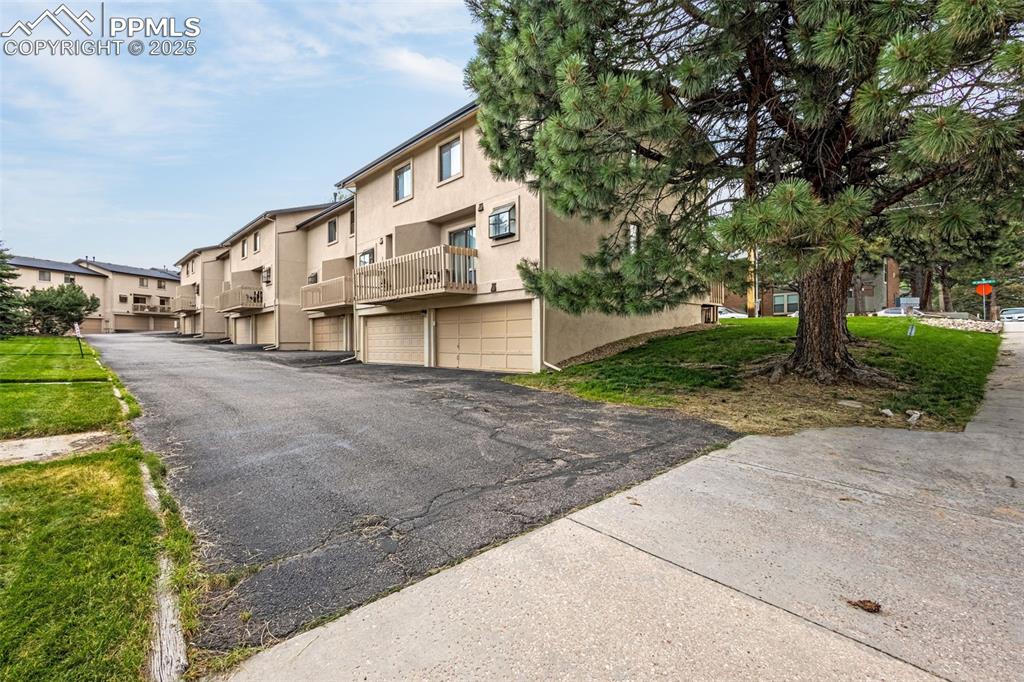 Image 16 of 27: View of road featuring a residential view