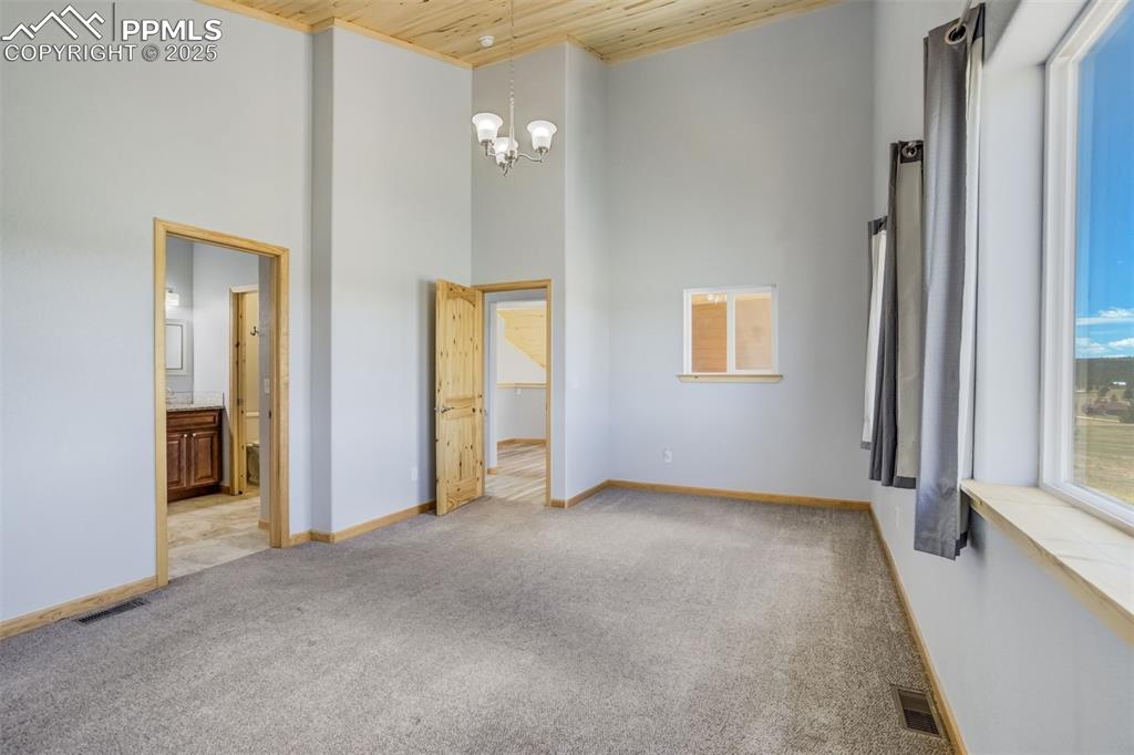 Image 24 of 39: Master Bedroom