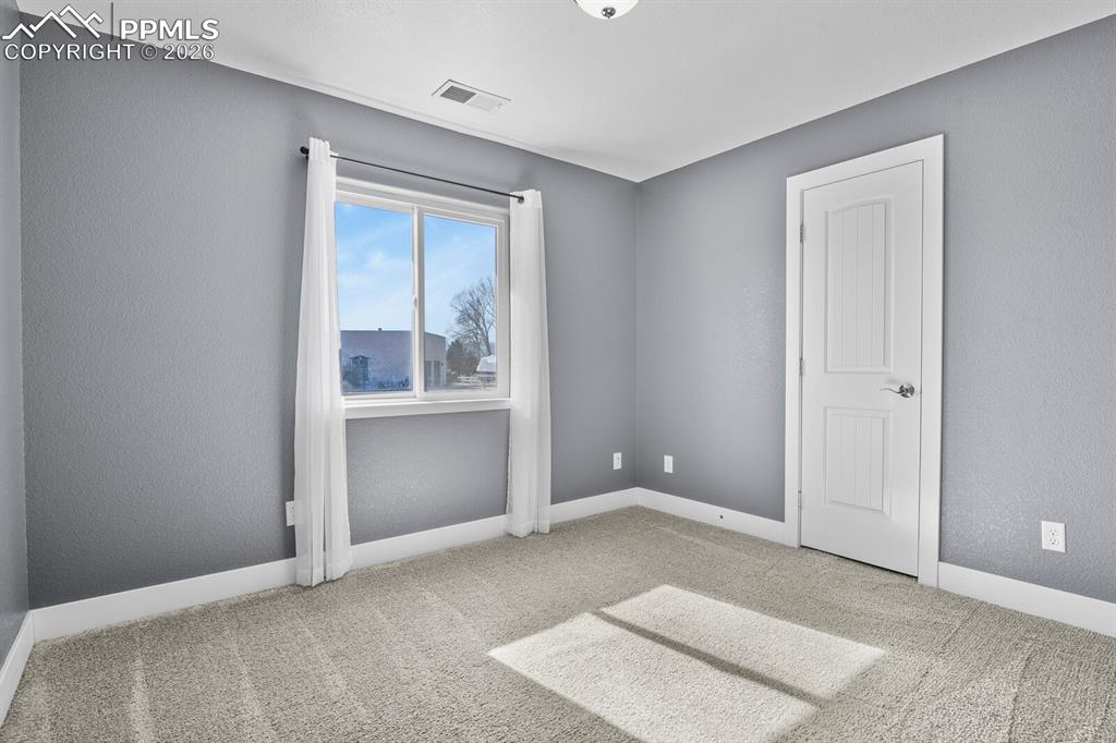 Image 22 of 37: Bedroom