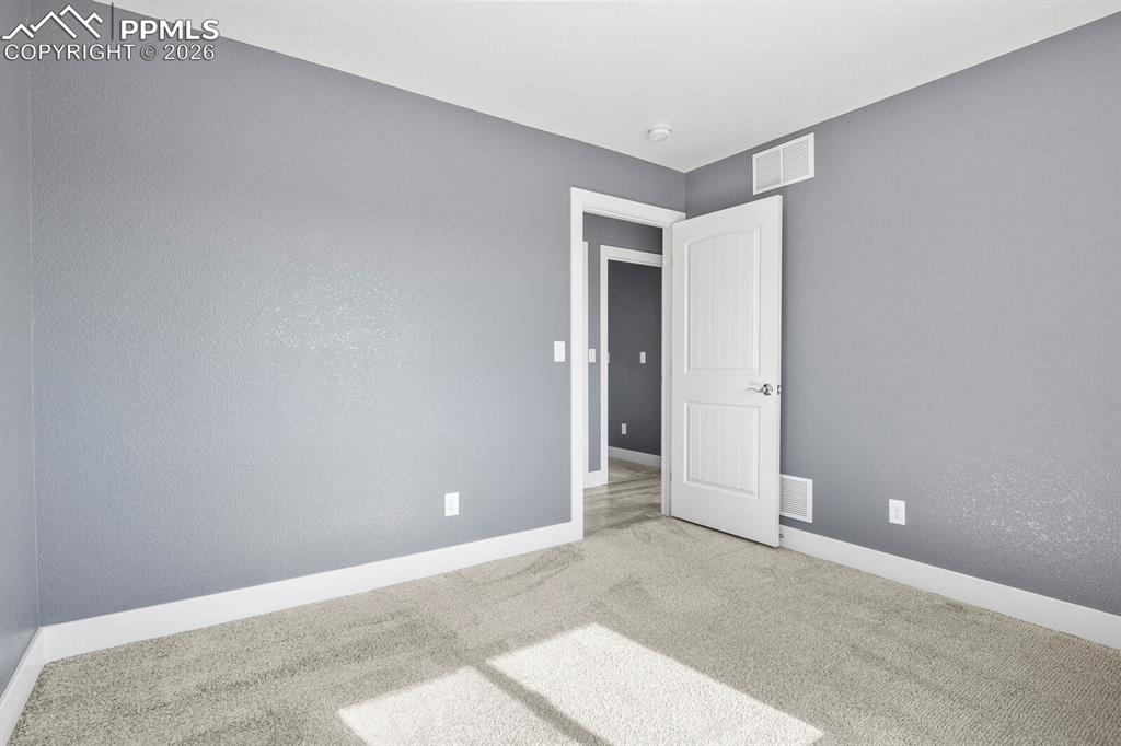 Image 23 of 37: Bedroom