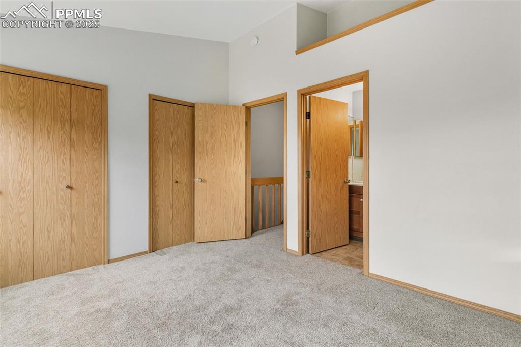 Image 14 of 31: Second Upstairs Bedroom with Dual Closets!