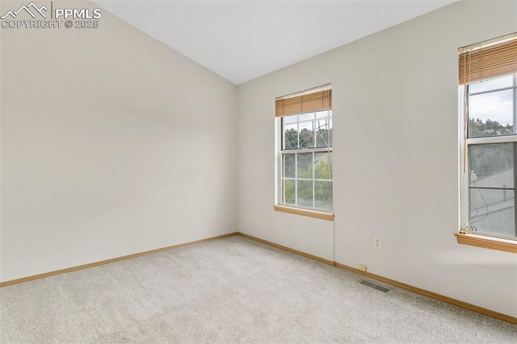 Image 15 of 31: Second Upstairs Bedroom with Adjoining Bathroom!