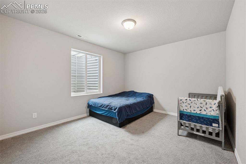 Image 21 of 30: Bedroom