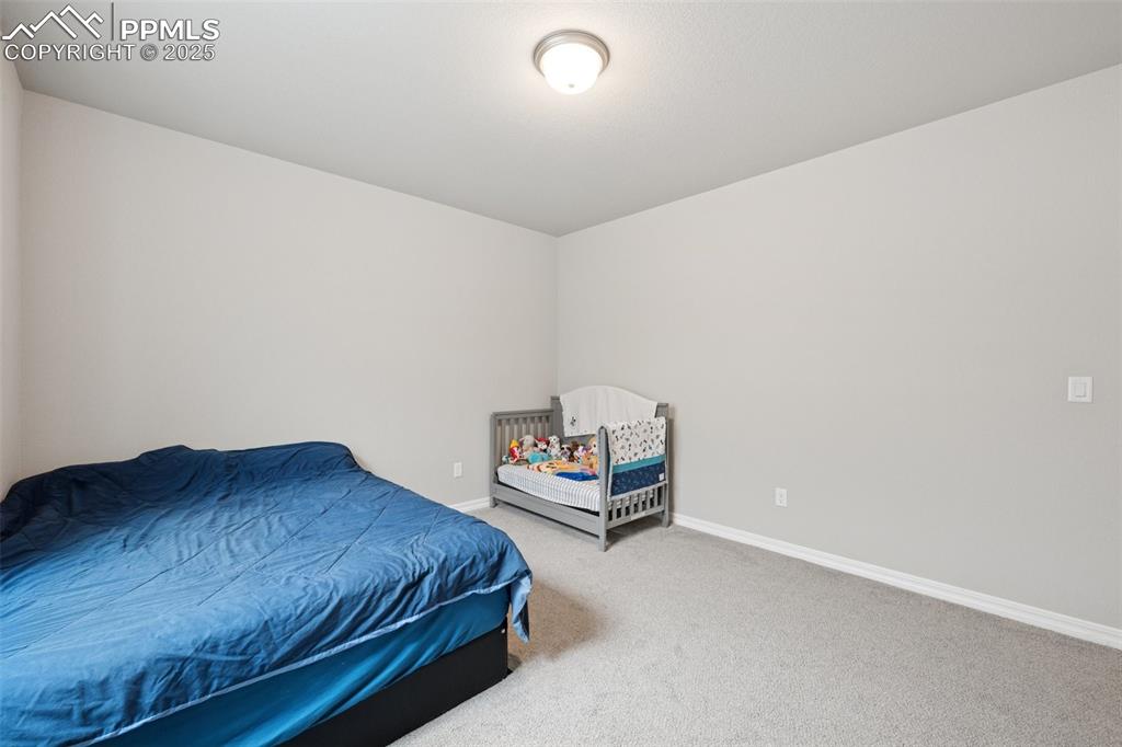 Image 22 of 30: Bedroom