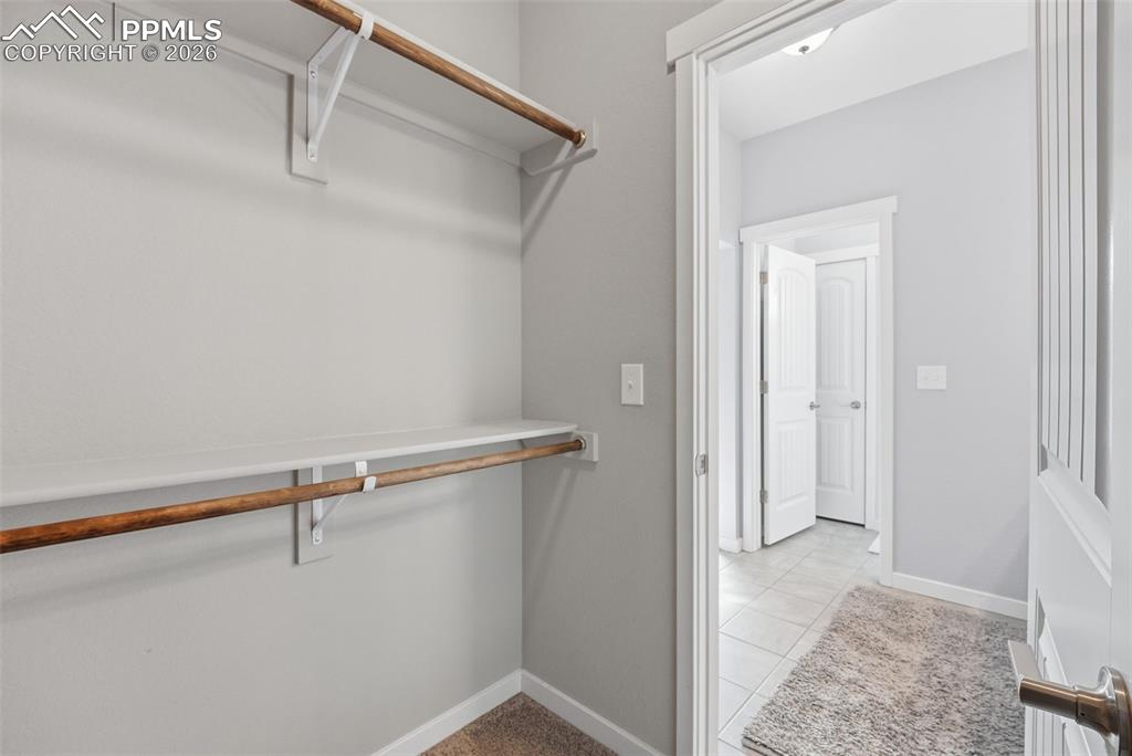 Image 24 of 33: Walk-In Closets