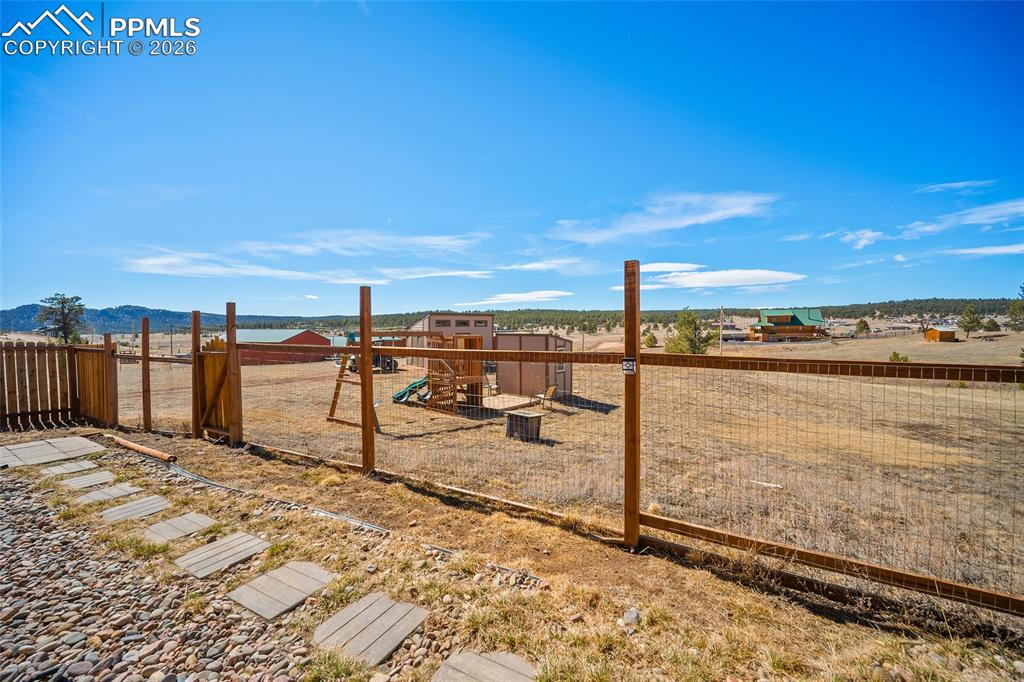 Image 38 of 45: Fenced in Dog Run