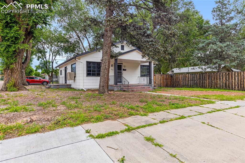 Image 3 of 16: Bungalow with a porch