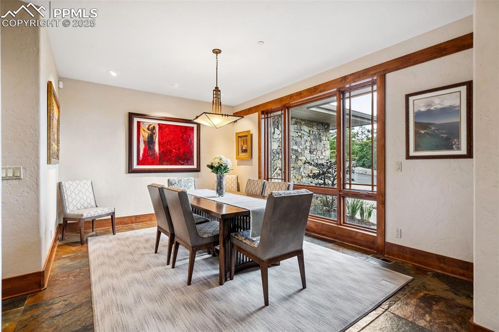 Image 12 of 50: Formal dining area