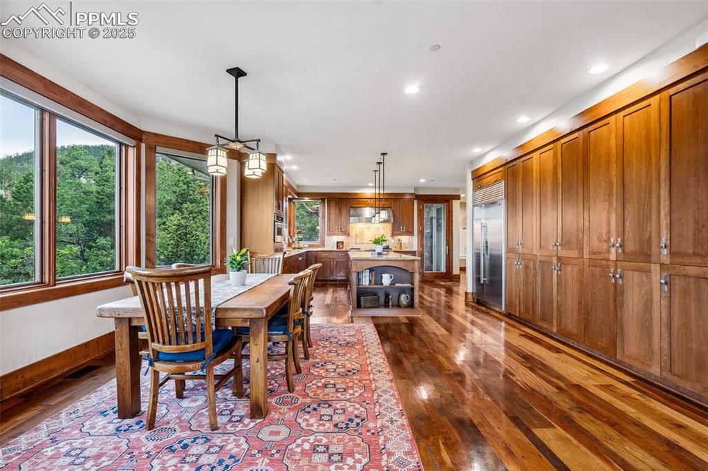Image 16 of 50: Part of the open plan connecting kitchen and family room