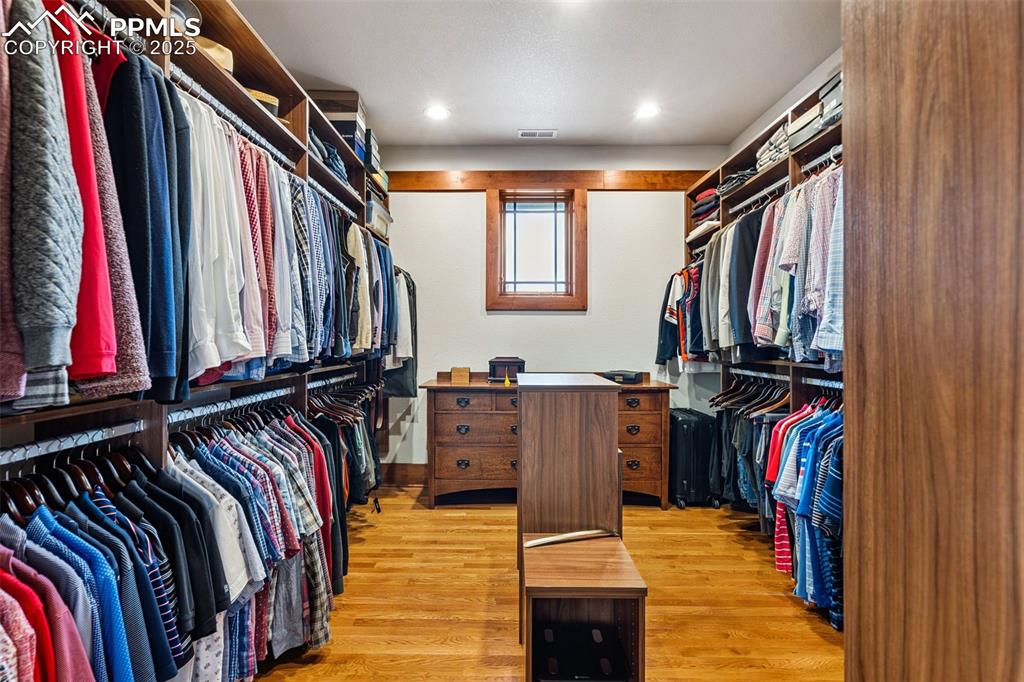 Image 30 of 50: Walk in closet