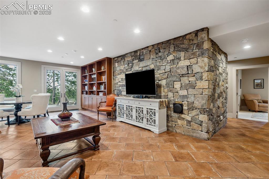 Image 34 of 50: Lower-level 2nd family room