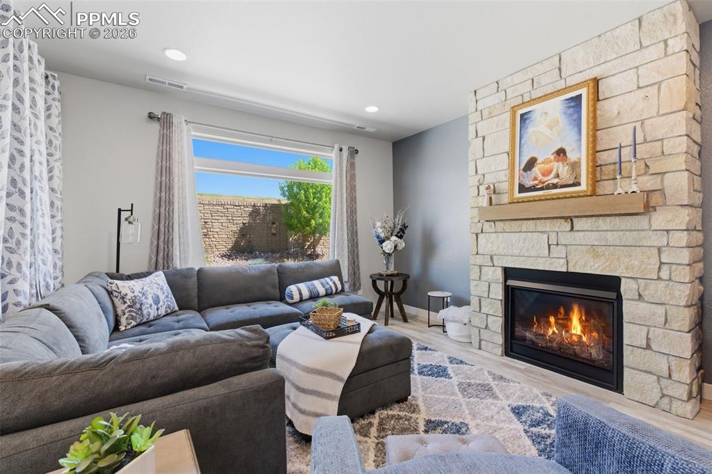 Image 10 of 36: Gas fireplace in living area